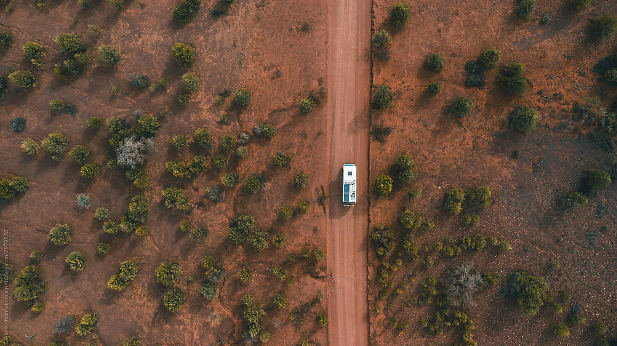 adventure truck on red dirt road