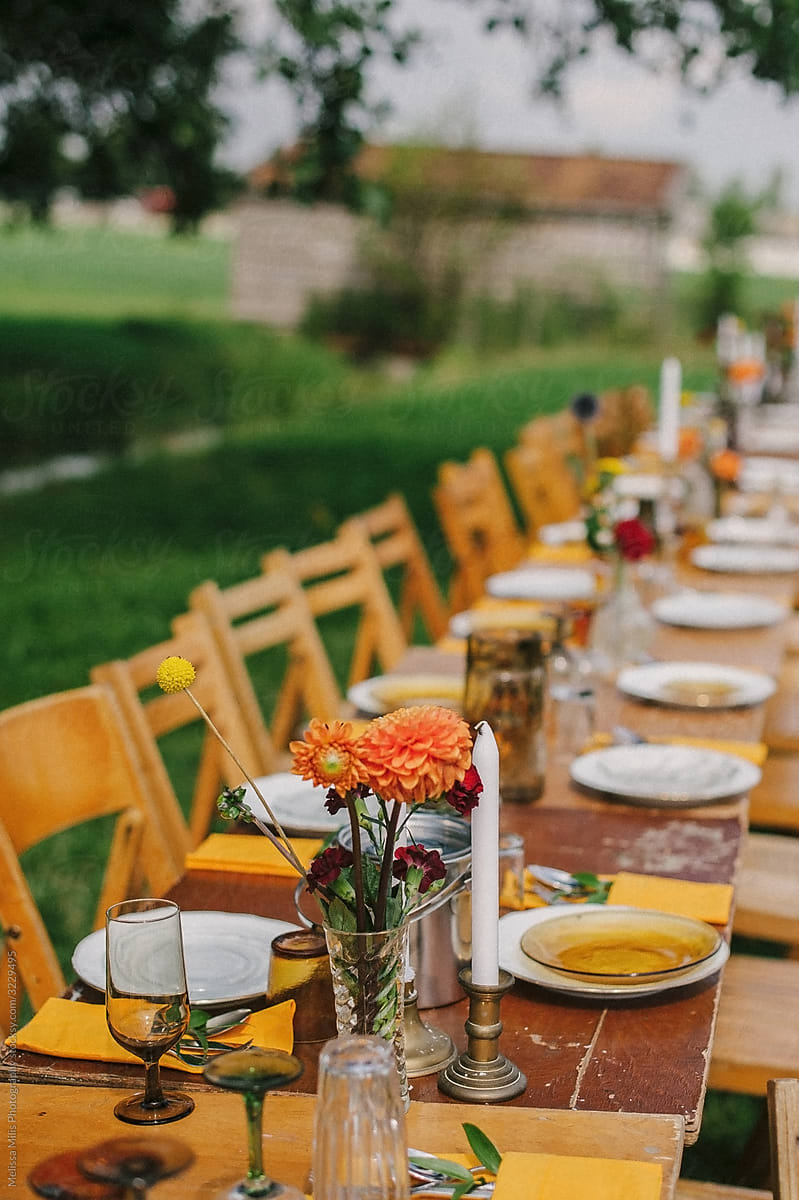 wooden table setting for a wedding