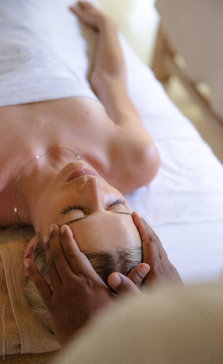 Woman Getting Massage on Head at spa