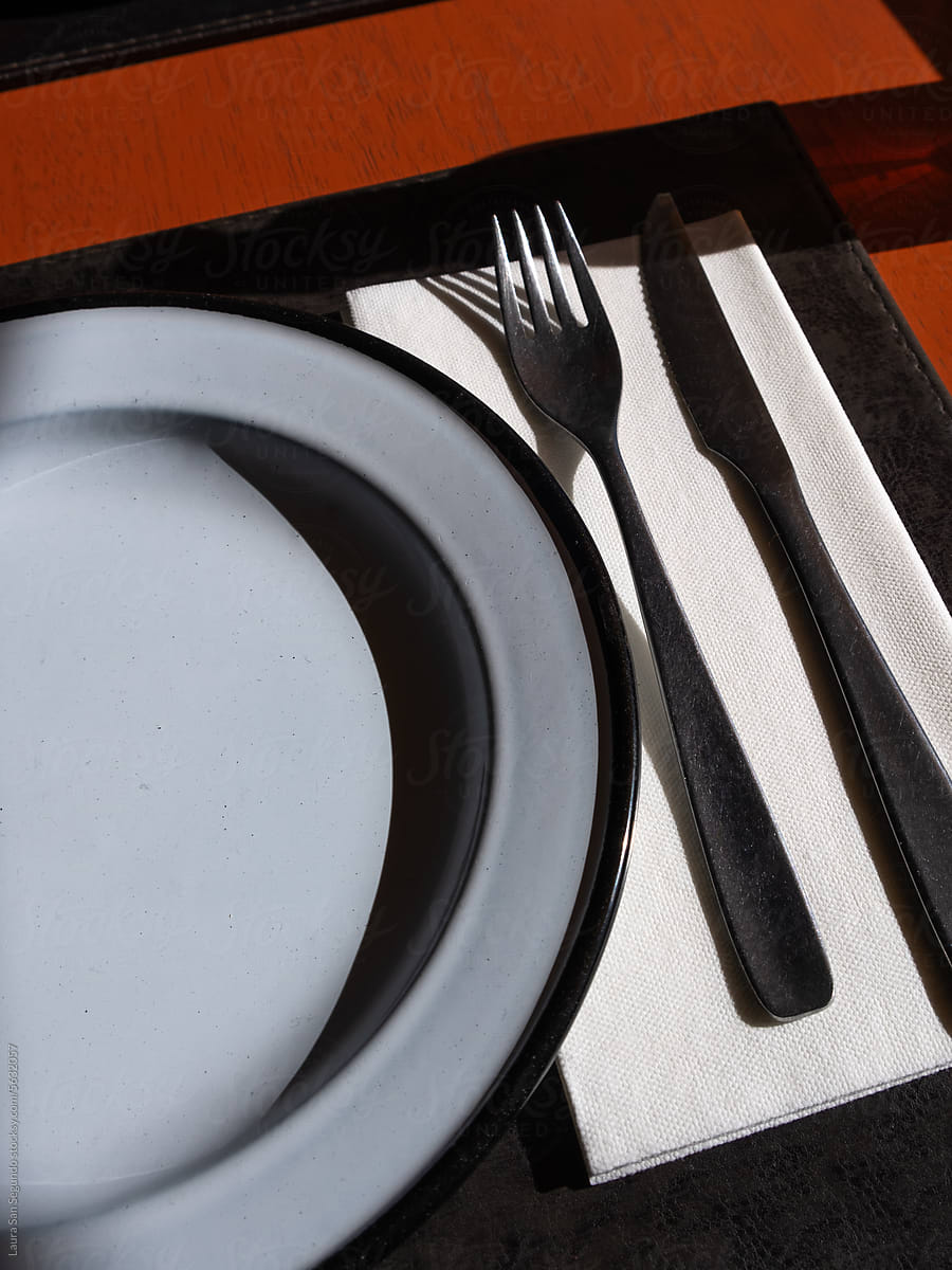 Plates and cutlery on a restaurant table