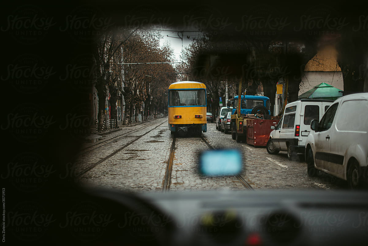 Vehicles on narrow city street
