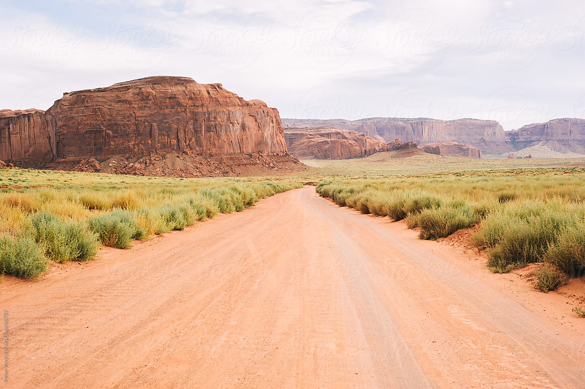 Dirt road in Monument Valley, Navajo Park, Arizona, USA