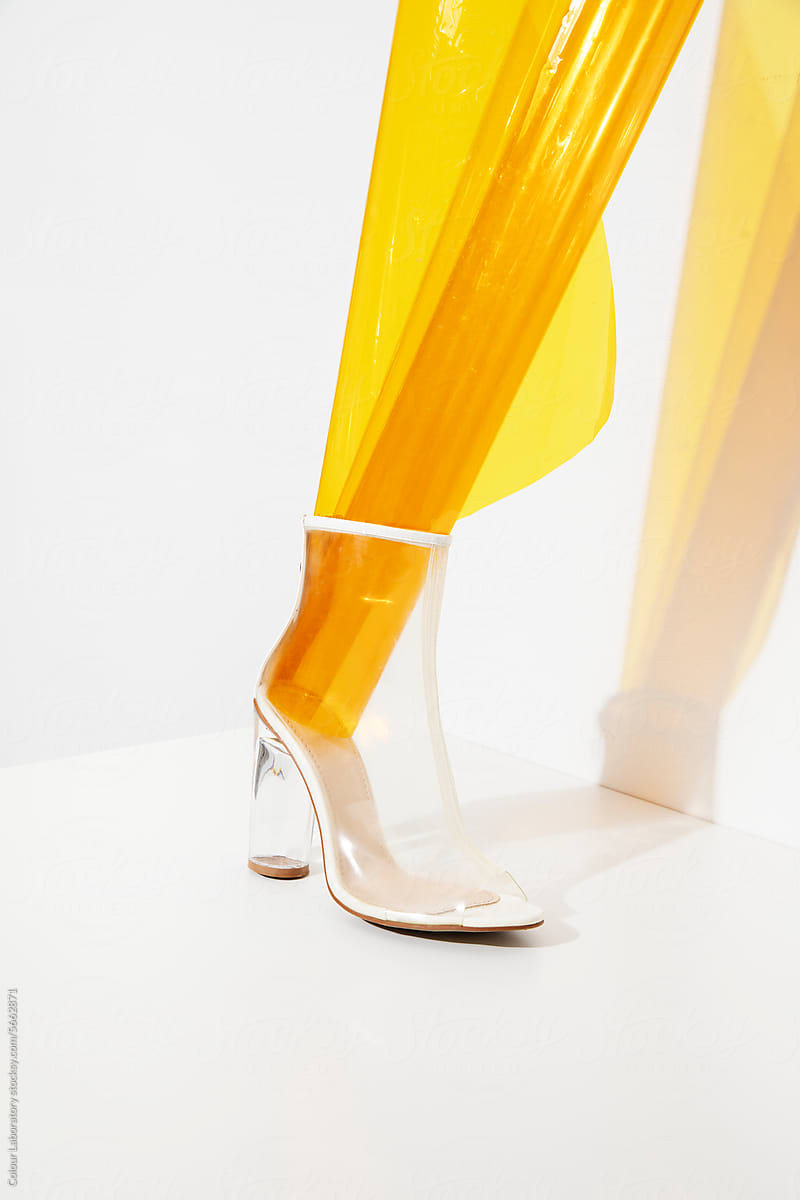 Transparent plastic high heel and yellow plastic inside it
