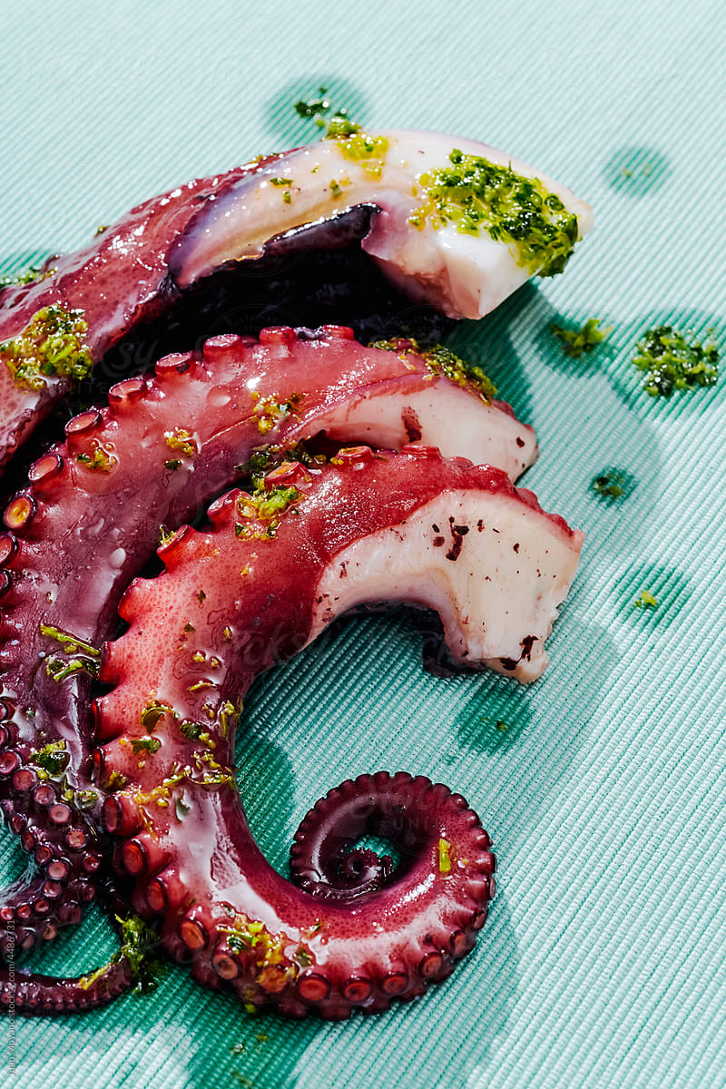 cooked octopus with garlic and parsley