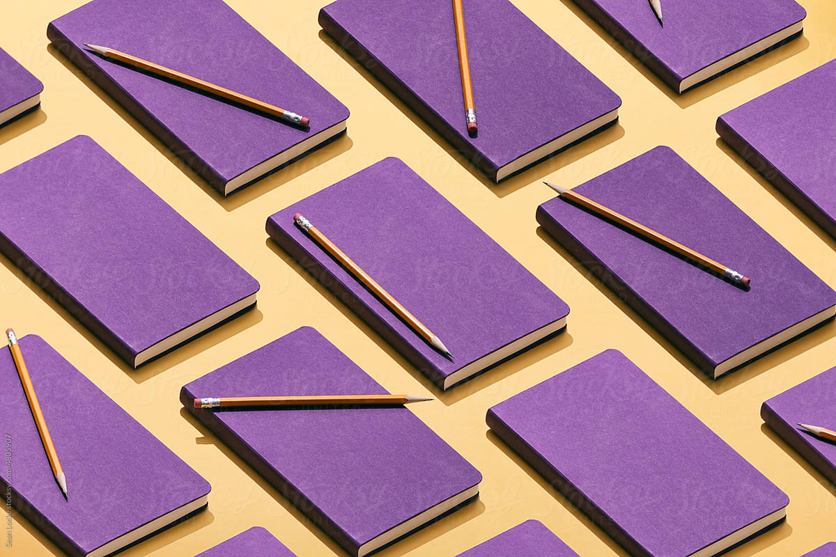 Pattern Of Purple Notebooks And Pencils