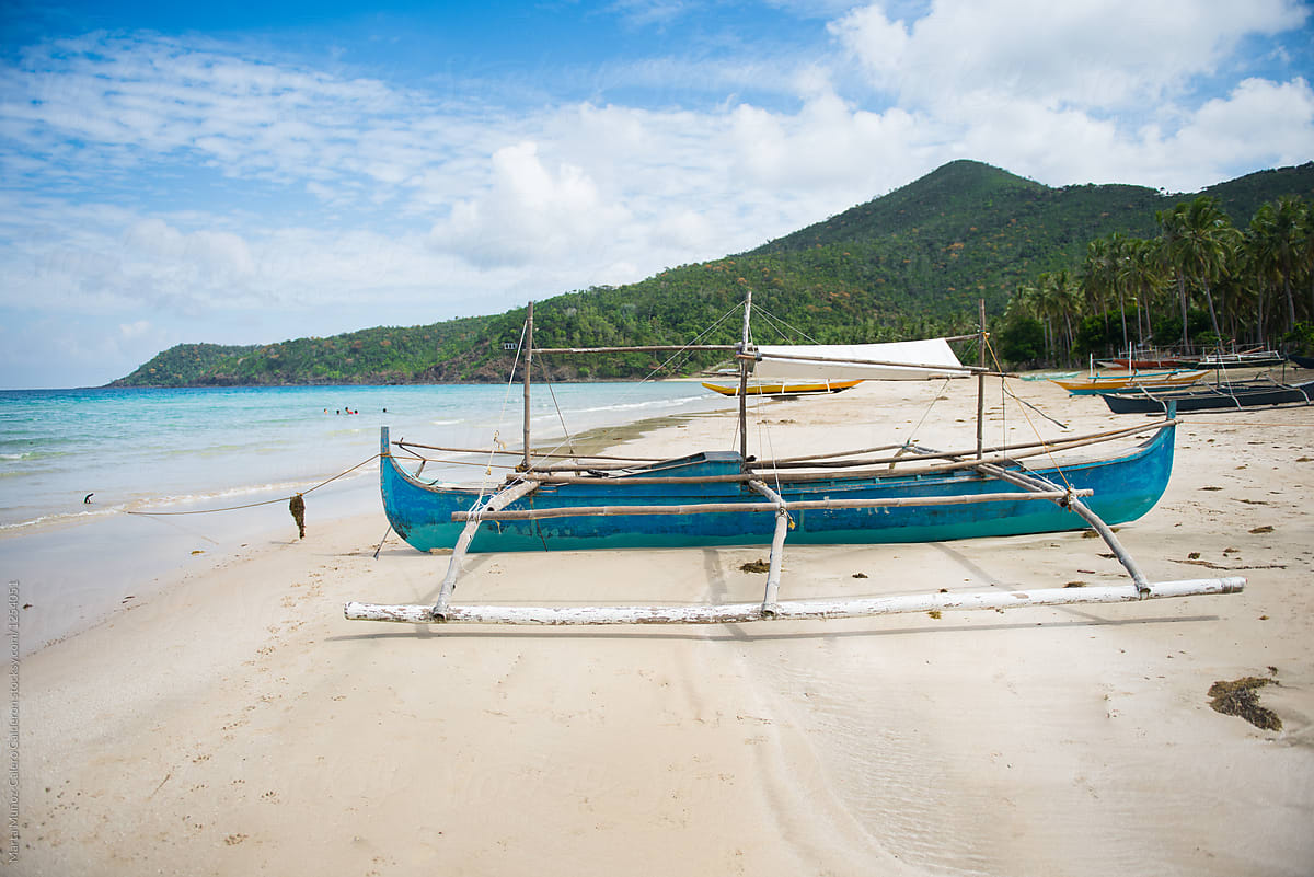 traditional philippines fishing boat with outriggers