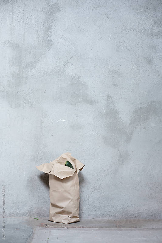 A paper bag with vegetable