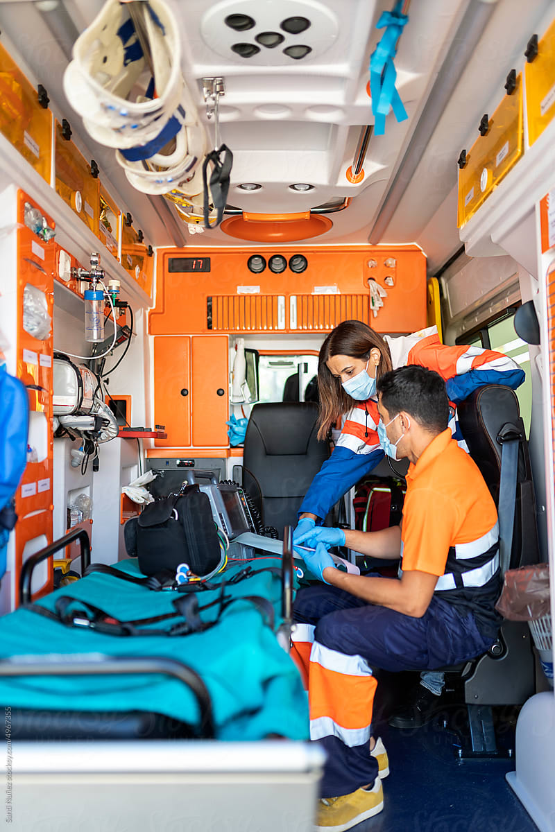 Paramedic Workers Inside an Ambulance