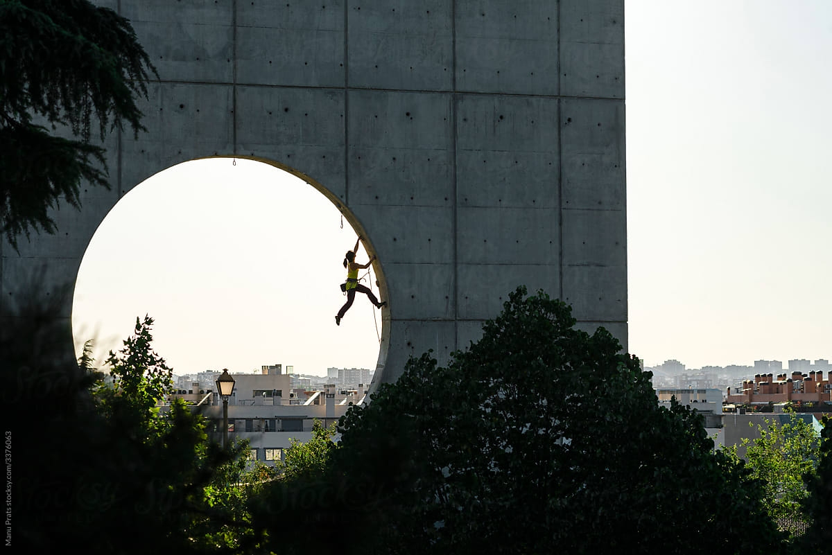 Woman climber urban climbing