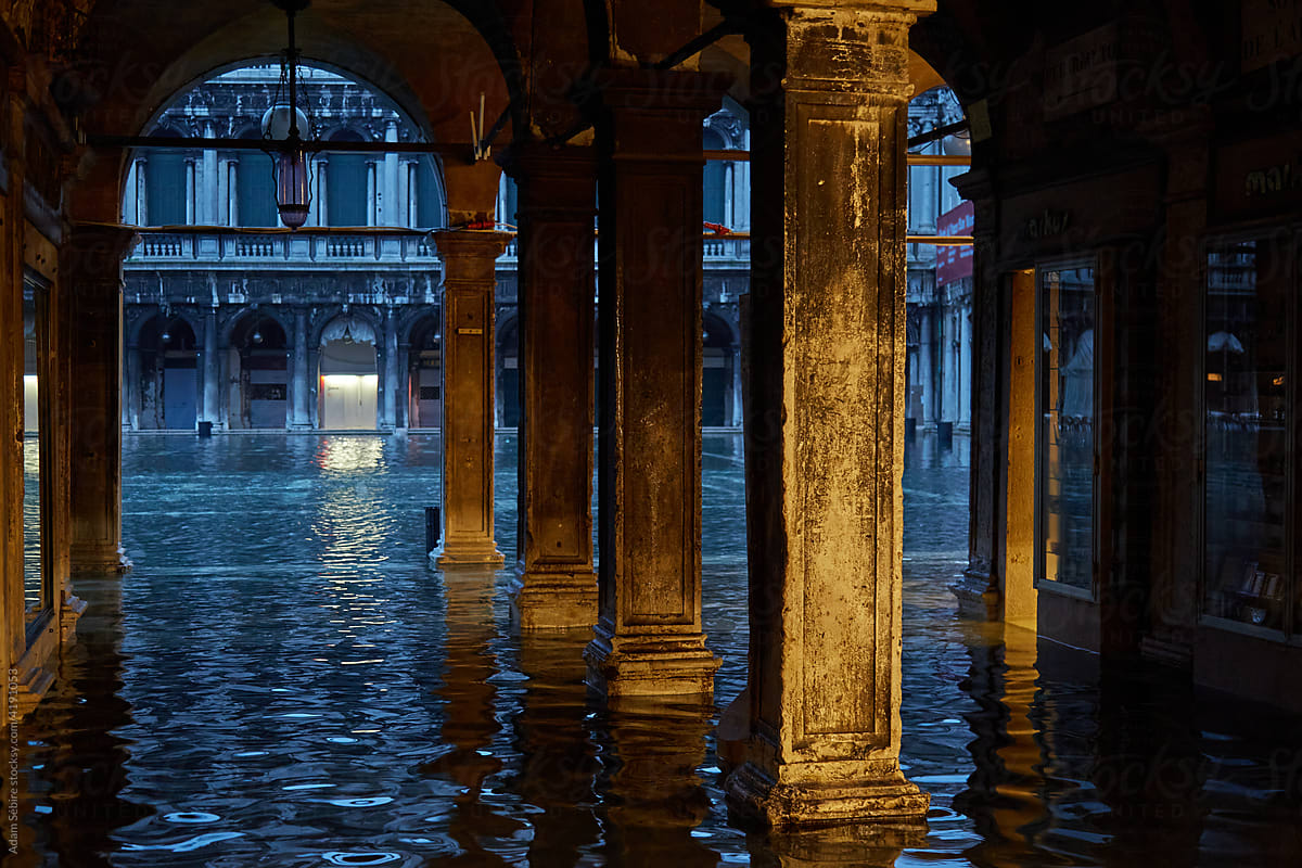 Acqua alta floodwaters inundate Venetian columns