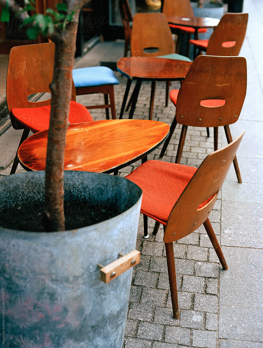 table and chairs at a street cafe