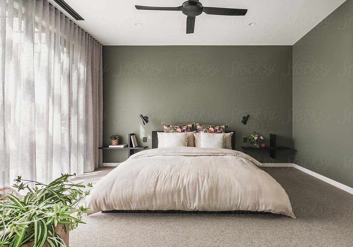 Modern sage green master bedroom