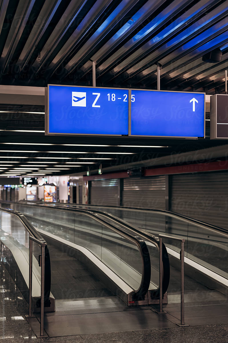 Digital signboards over escalators in airport