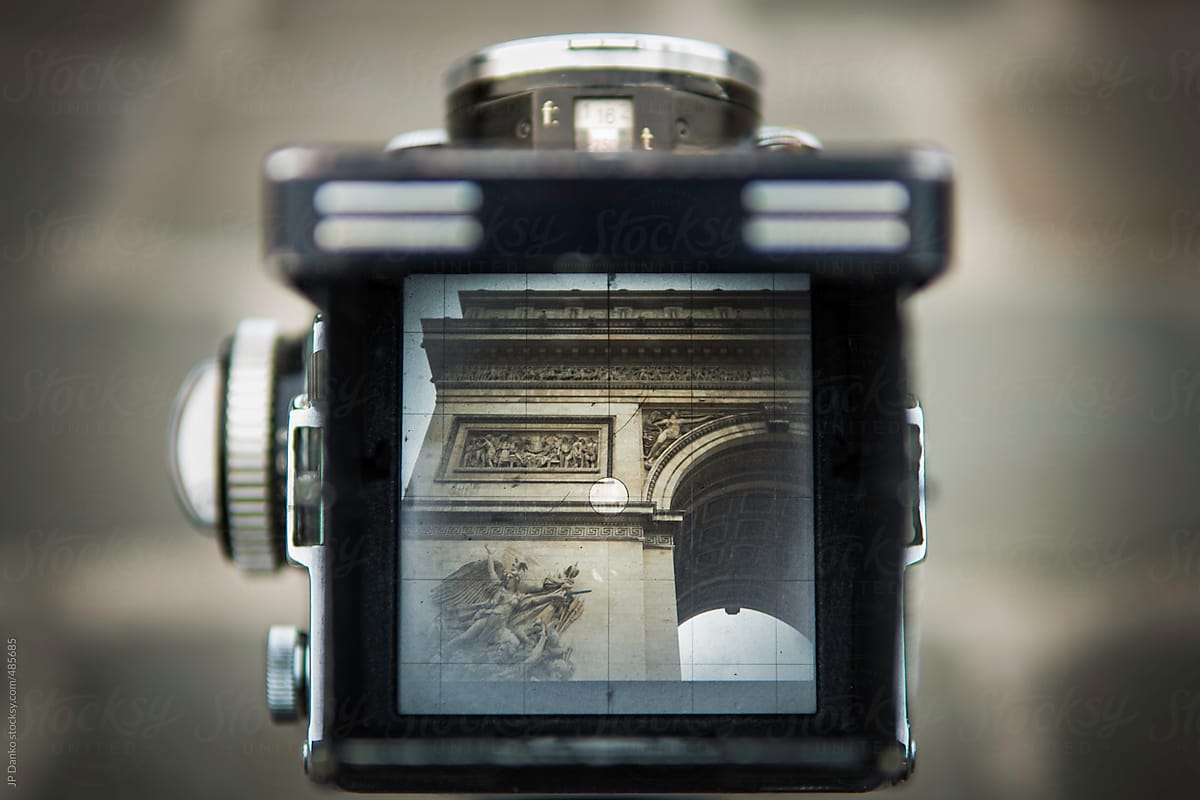 Vintage Film Medium Format Camera Photographing the Arc de Triomphe Paris