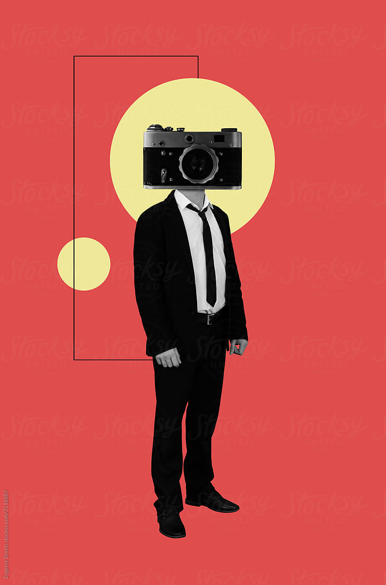 A man with retro film camera instead of a head