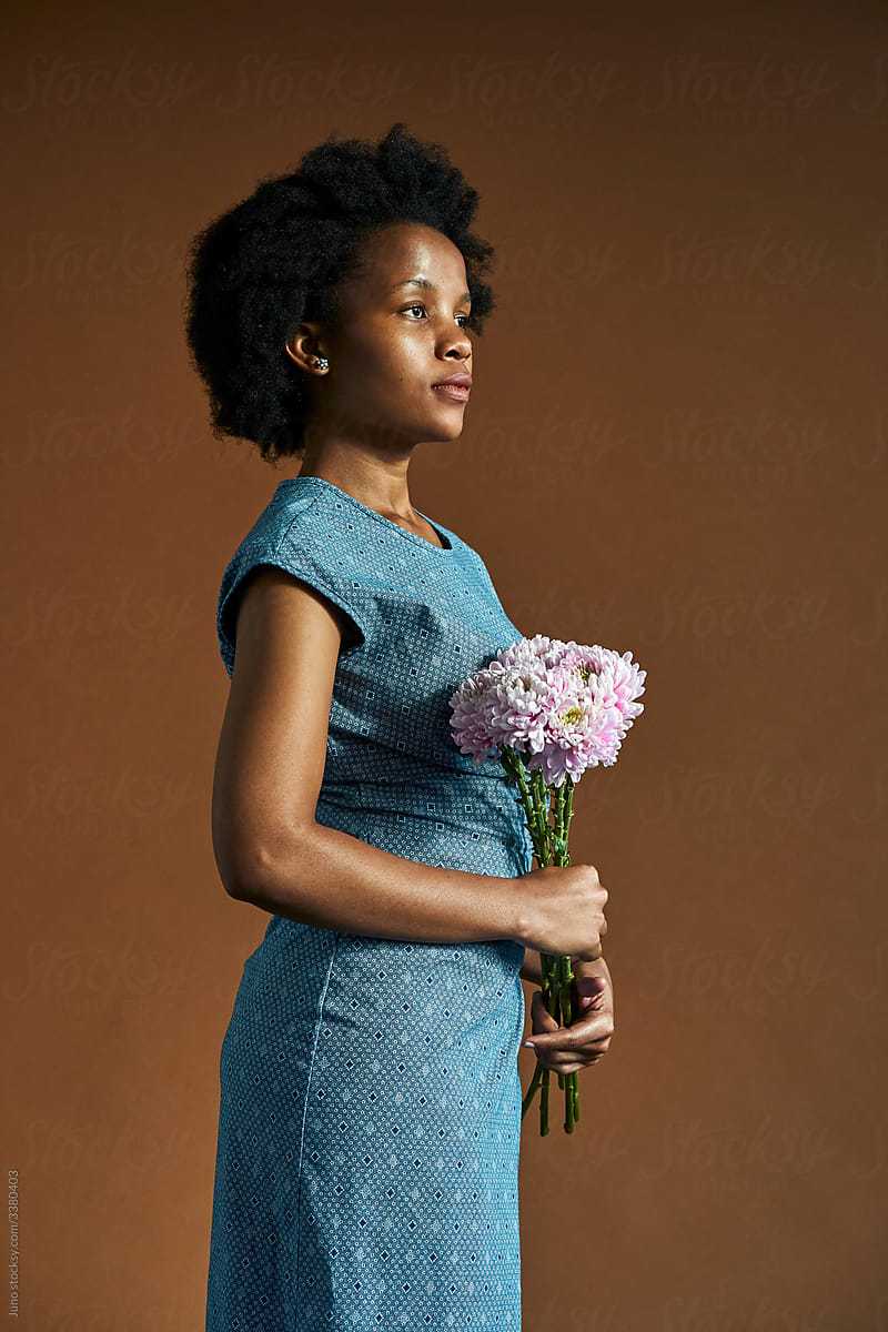 African woman with flowers