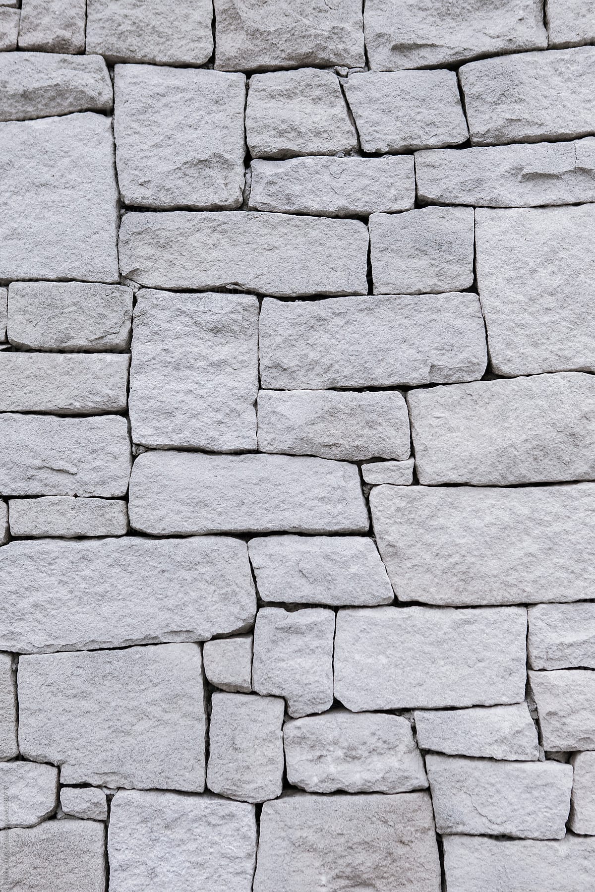 Stacked stone wall background.