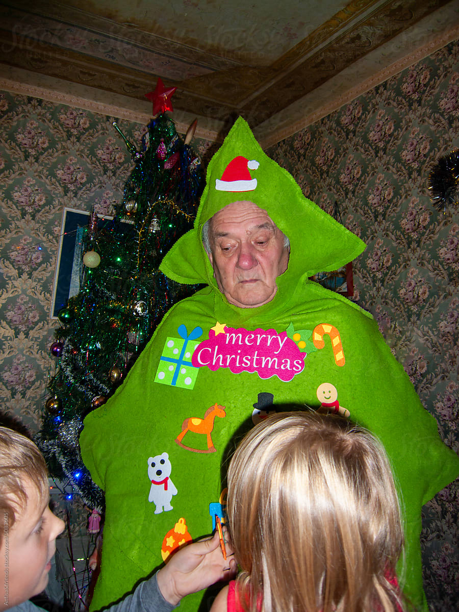 New Year Family Party With Funny Christmas Tree" by Stocksy Contributor  "Anfisa&friends" - Stocksy
