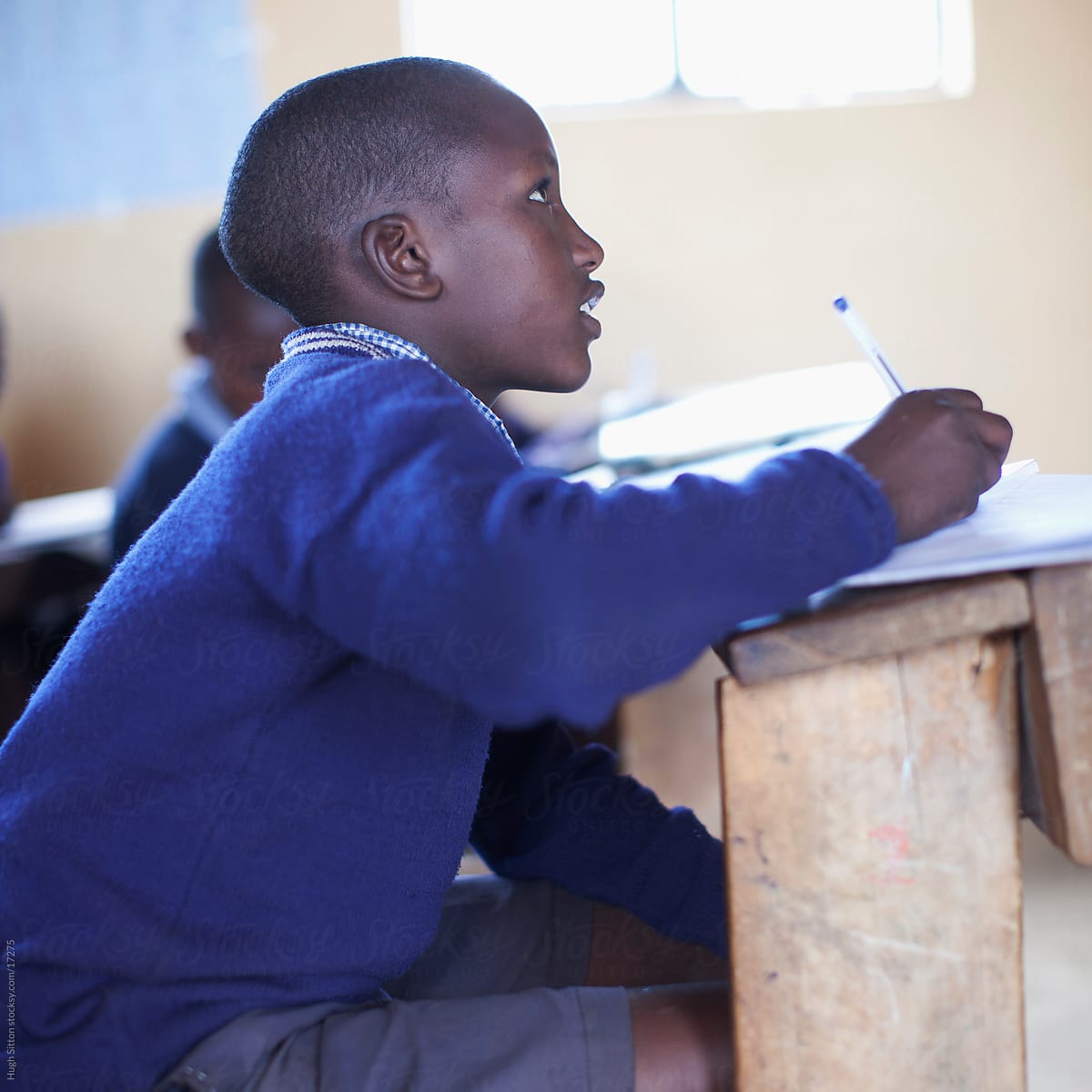 School children in busy classroom. Kenya Africa.