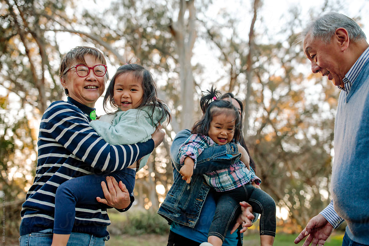 Asian grandparents with granddaughters