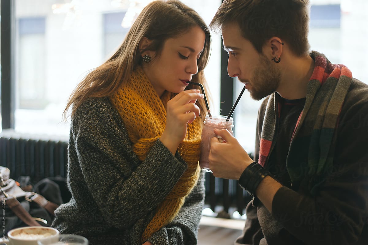 Cute Couple Sharing Coffee