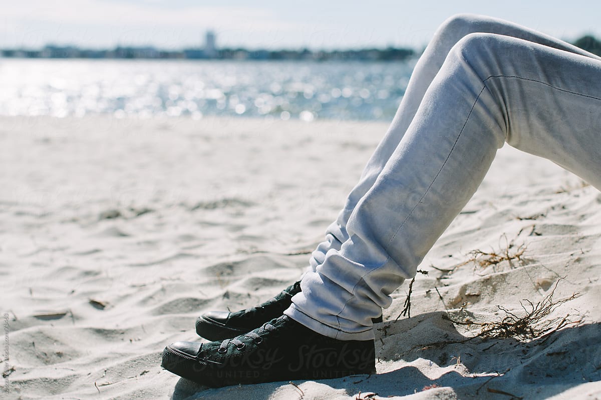 Girls Legs Sitting By Water By Stocksy Contributor Jacqui Miller Stocksy 0946