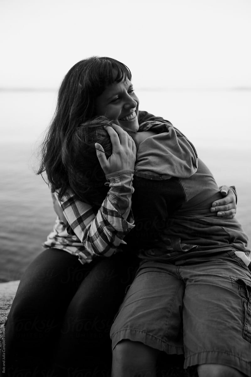 Mother And Son Enjoying Each Other Outside Del Colaborador De Stocksy