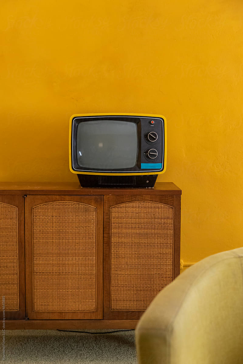 Vintage Seventies Analog Television on sideboard cabinet