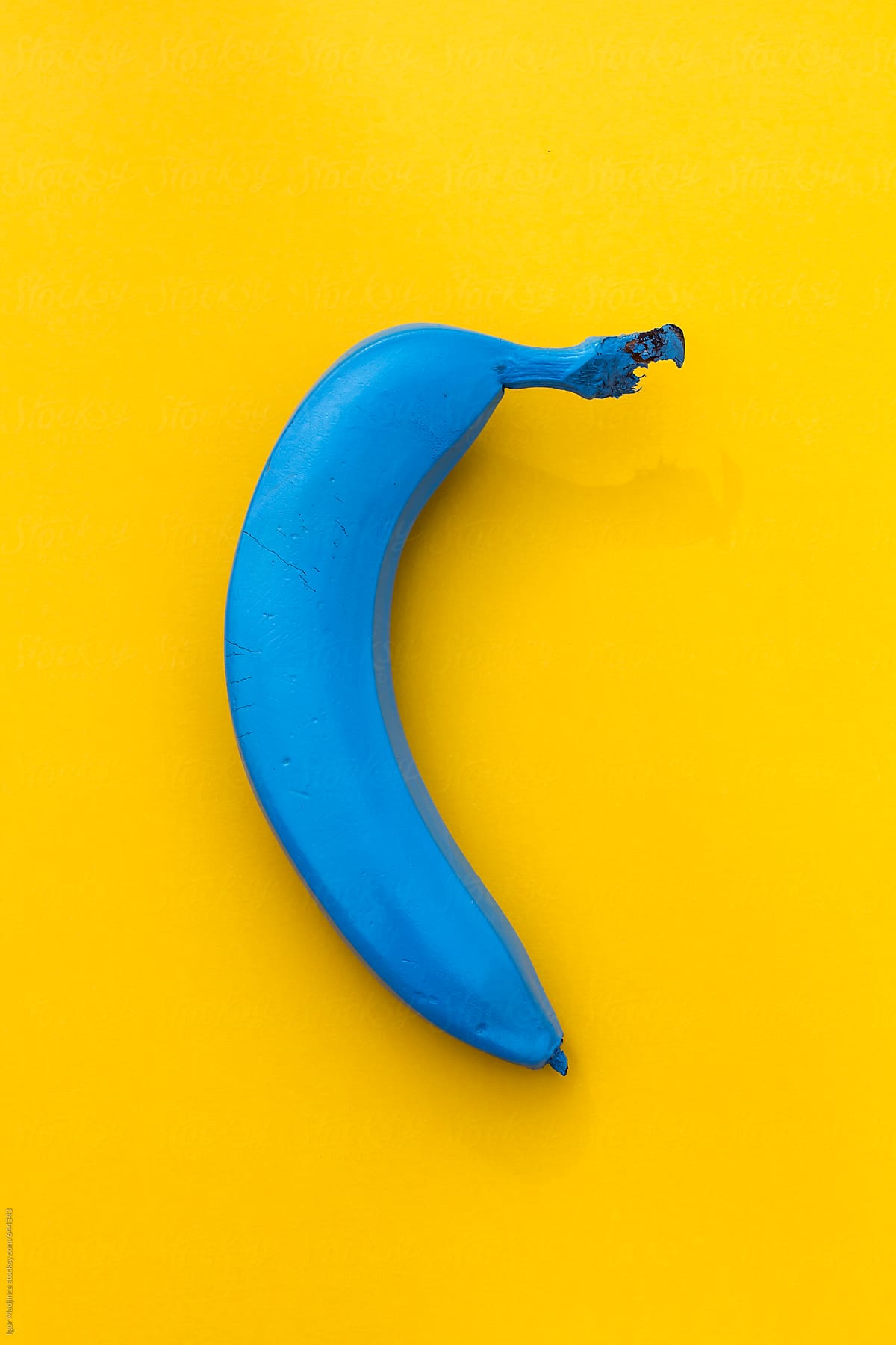 Blue Banana On A Yellow Background, The Contrast by Stocksy Contributor Igor  Madjinca - Stocksy