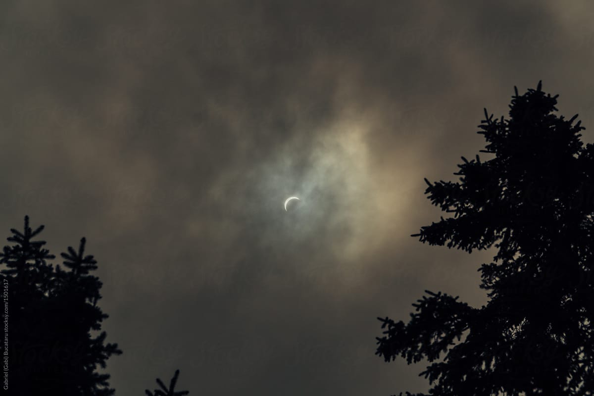 Total solar eclipse on a cloudy day