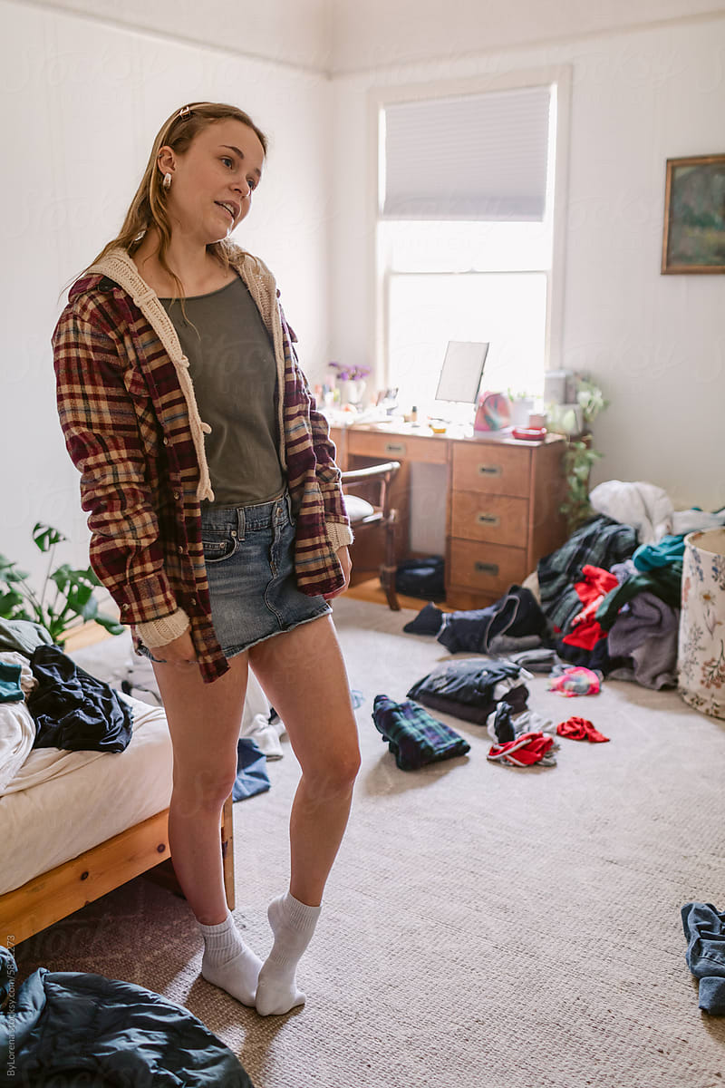 Teen deciding on clothes