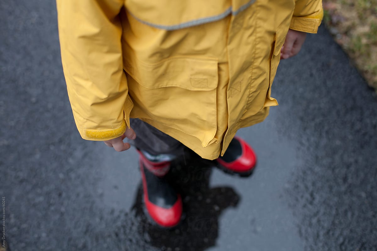 Child in Yellow Raincoat