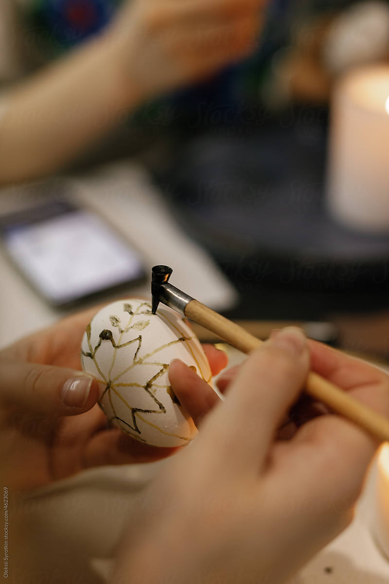 Egg decorating. Ukrainian tradition. Heated beeswax. Natural product