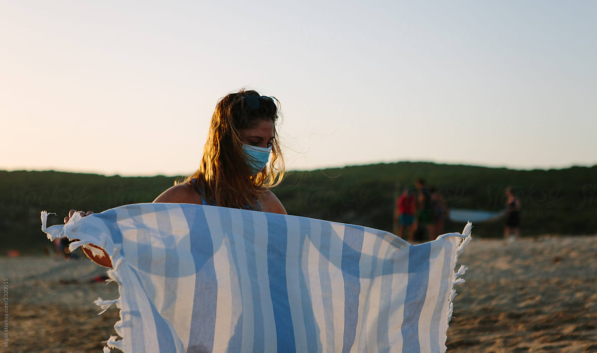 Folding up beach towel