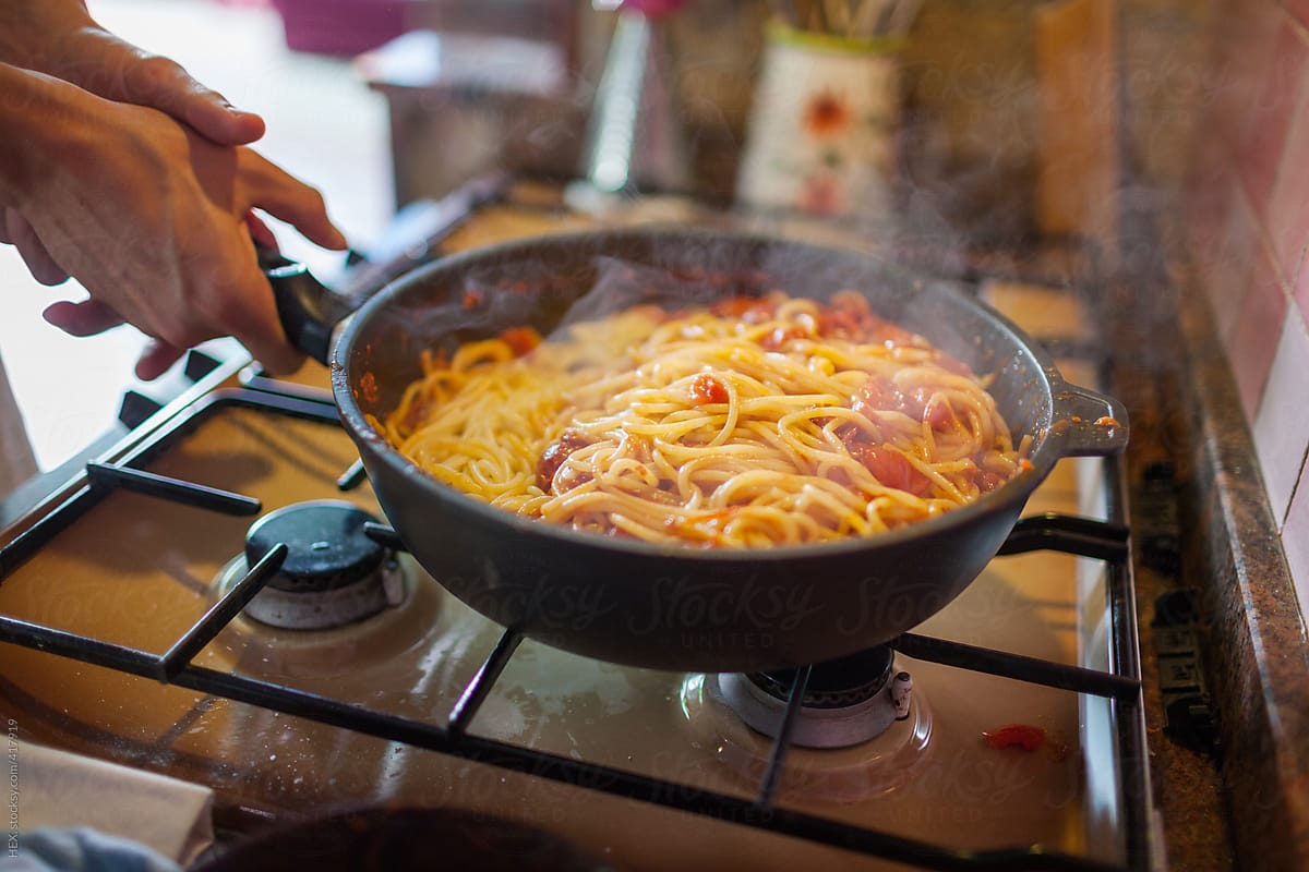 Preparing Italian Spaghetti Pasta in the Pan