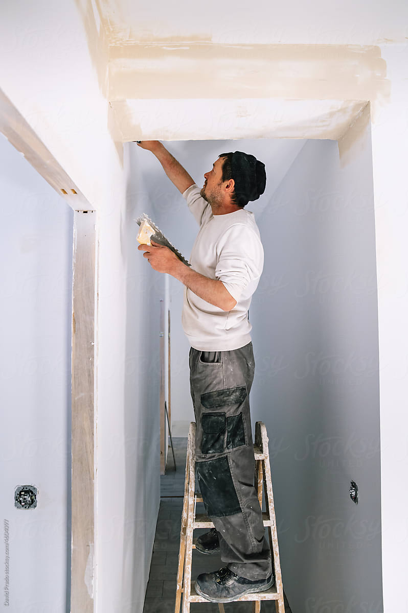 Interior designer fixing for painting wall