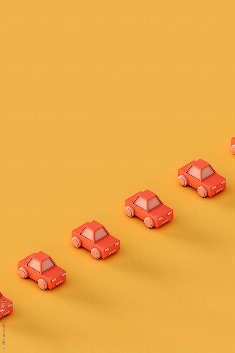 a row of Pink toy car on a yellow background
