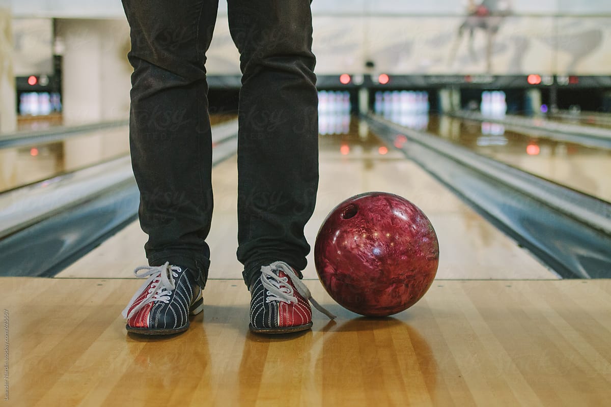 Bowling Shoes And Bowling Ball In Bowling Alley" by Stocksy Contributor "Akela - From Alp To Alp" - Stocksy