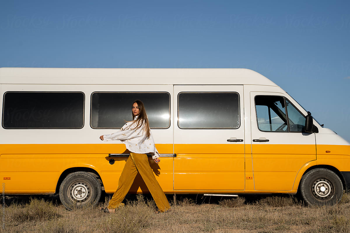 Woman with camper van