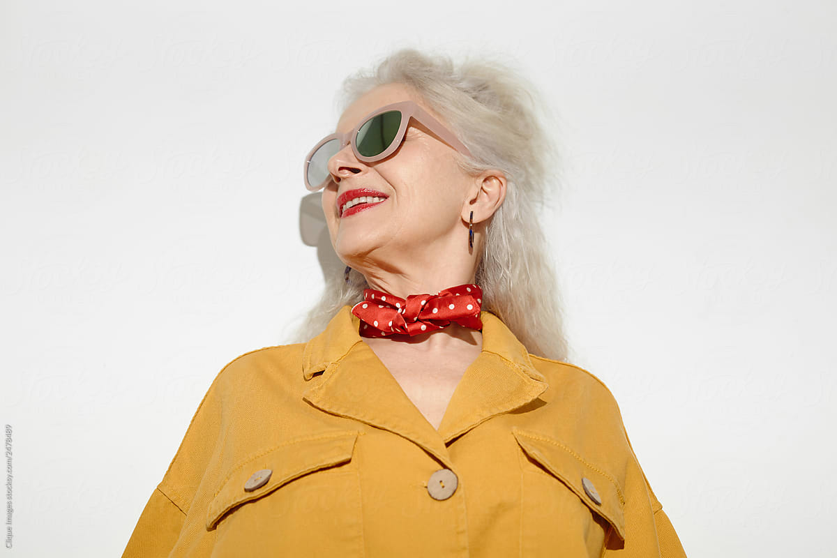 Portrait Of Aged Woman In Sunglasses