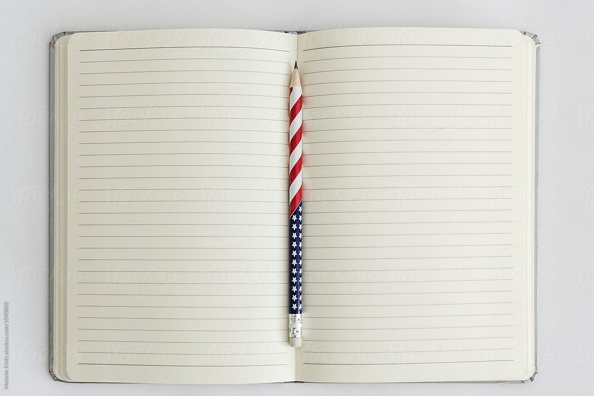 Open Blank Notebook With A Stars And Stripes Pencil by Stocksy Contributor  Melanie Kintz - Stocksy