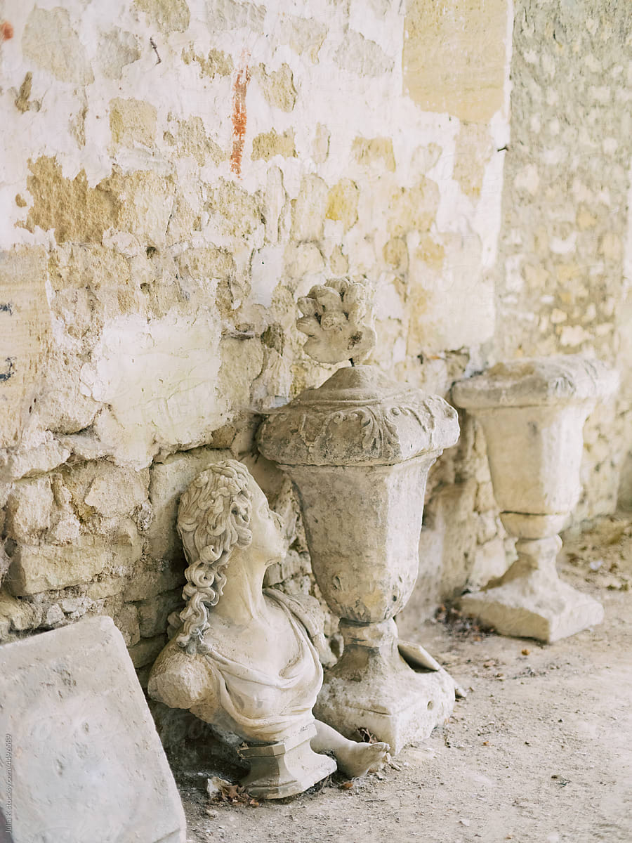 Antique Statues Near A Wall