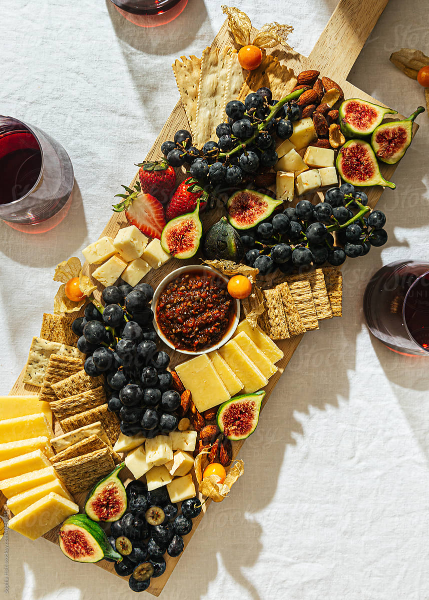 Charcuterie board with red wine