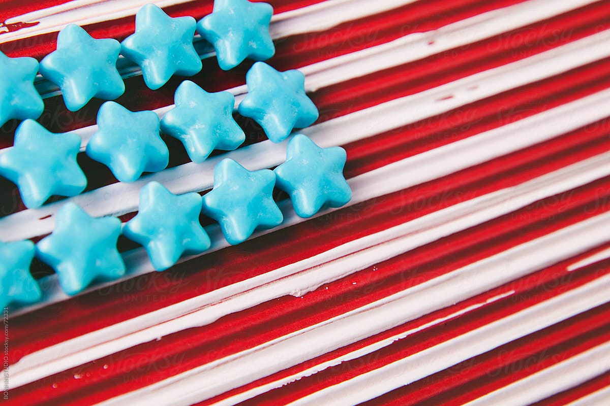 Handmade usa flag with sugar stars and painted red background.