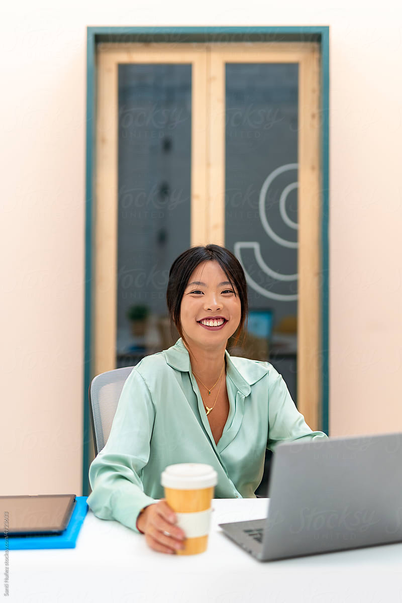 Asian entrepreneur woman in a modern office