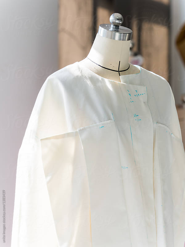 Made-up white t-shirt/dress on mannequin in studio