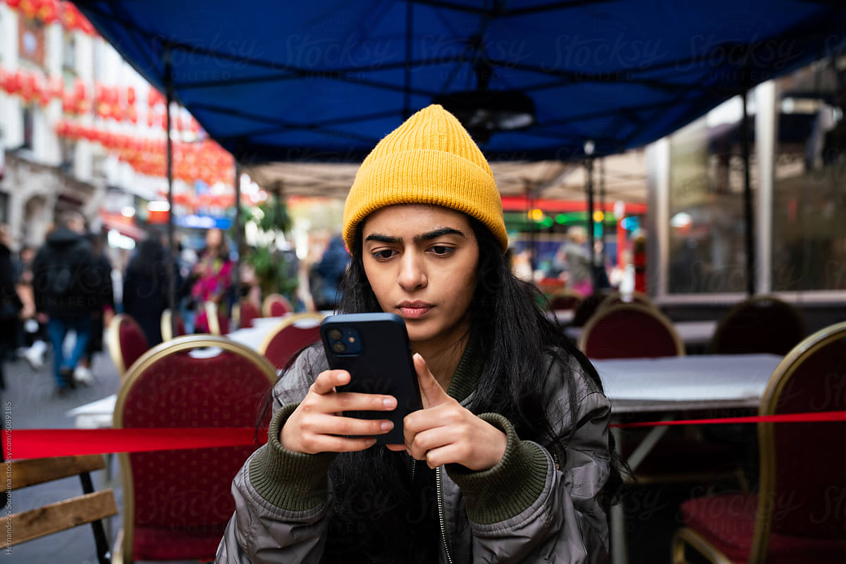 Person Using Smartphone Outdoors