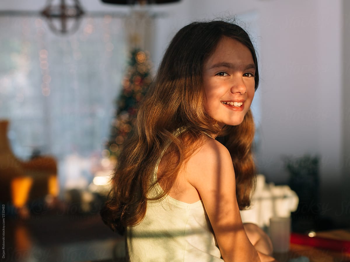 Smiling Girl Looking At Camera By Dejan Ristovski 