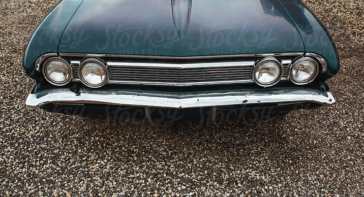 Detail Of A Vintage American Muscle Car's Front Grill by Stocksy  Contributor Riley JB - Stocksy