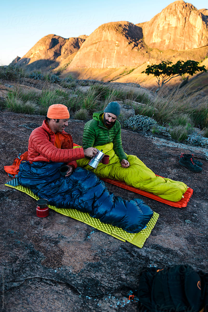 Adult backpackers bivouacking